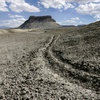 Photo: ATV tracks cross the land leading to Factory Butte
