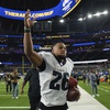 Philadelphia Eagles running back Saquon Barkley (26) jogs back to the locker room after an NFL football game against the Los Angeles Rams, Sunday, Nov. 24, 2024, in Inglewood, Calif.