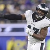 Philadelphia Eagles linebacker Nakobe Dean reacts after sacking Los Angeles Rams quarterback Matthew Stafford during the first half of an NFL football game in Inglewood, Calif., Sunday, Nov. 24, 2024.
