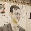 Photo: An image of Syrian President Bashar Assad, riddled