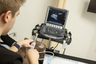 Ryan Latoski, simulation maintenance coordinator for Touro University Nevada, demonstrates the CentraLine trainer with ultrasound, a device used to simulate accessing jugular veins using various methods Wed. December 18, 2024. Touro University Nevada has become the first fully accredited simulation center in Nevada.