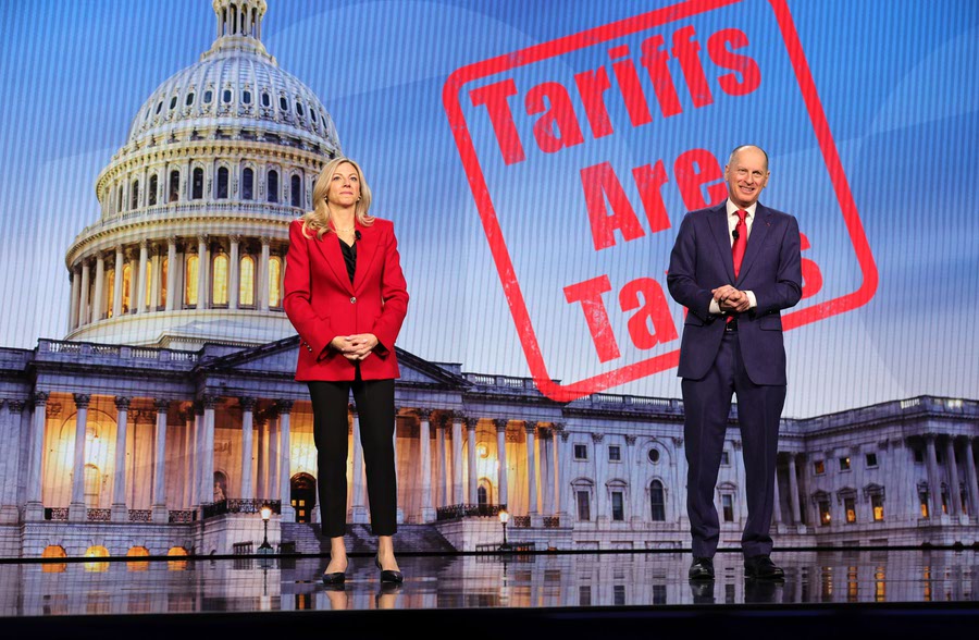 Kinsey Fabrizio, left, president of the Consumer Technology Association (CTA), and Gary Shapiro, CEO and vice chair of the CTA, speaks out against tariffs before a Panasonic keynote during CES 2025 at the Venetian Tuesday, Jan. 7, 2025. STEVE MARCUS