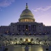 Photo: The sun rises behind the U.S. Capitol as a rehears
