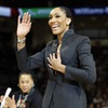 A'ja Wilson waves during a number-retirement ceremony before an NCAA college basketball game between South Carolina and Auburn in Columbia, S.C., Sunday, Feb. 2, 2025.