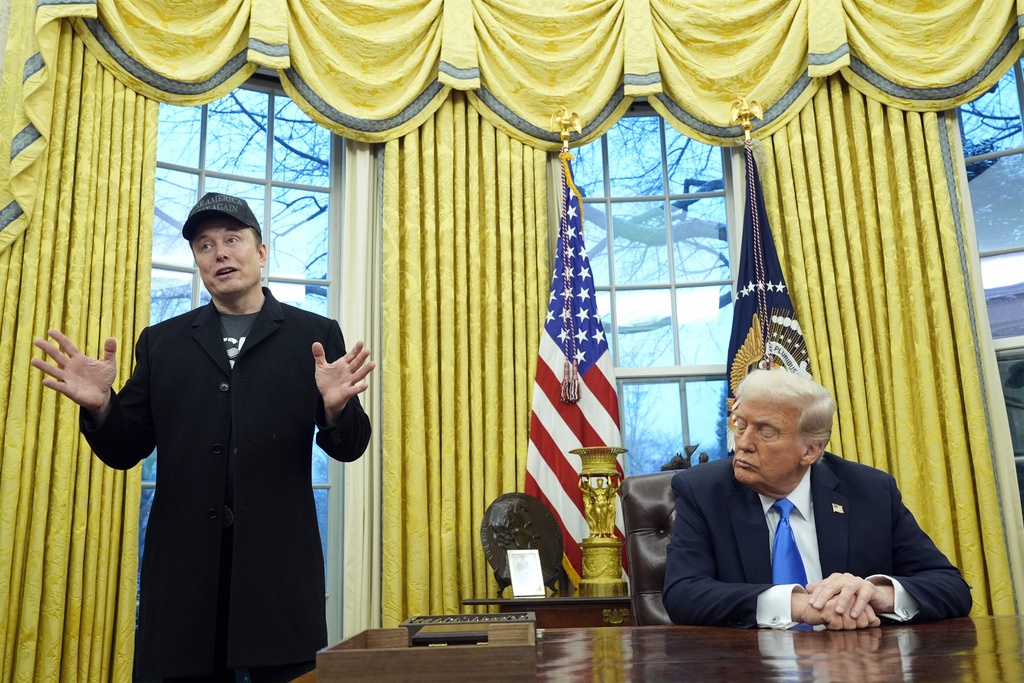 Legal experts say Trump official broke law by saying 'Buy Tesla' stock but don't expect a crackdown