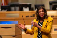 Mayor Shelley Berkley, wearing a bright yellow blazer and even brighter smile, stood next to a podium in front of a small crowd Thursday morning inside the council chambers of Las Vegas City Hall, fielding questions from reporters ...