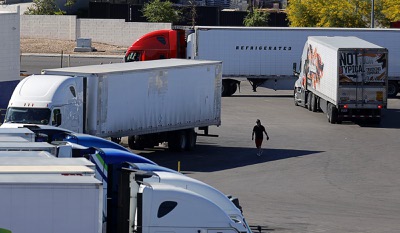 A man walks across the parking lot at the TA Travel Center on northeast corner of Dean Martin Drive and Blue Diamond Road Wednesday, May 7, 2025.