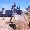 George Kypreos, president of Las Vegas Realtors, dumps a load of rock in the front yard of a house belonging to a low-income senior homeowner near downtown Henderson Friday, May 16, 2025. The event, in collaboration with Rebuilding Together Southern Nevada, was part of Realtor Volunteer Days being held nationwide May 10-18.