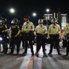 Photo: Police stand ready in downtown Las Vegas during a 