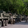 Photo: U.S. Army soldiers work on Stryker combat vehicles