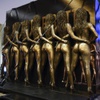 Photo: The Crazy Girls statue is shown in after arriving 