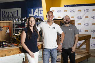 From left, Addi Gibson, Shop Class Foundation Inc
Vice-President of the Board, Jeff Gibson, Shop Class Foundation Inc President of the Board and Deniz Bayramoglu, Bay Law Attorney, pose for a photo in a workshop at JAG Development in Henderson, Monday, June 30, {year4.