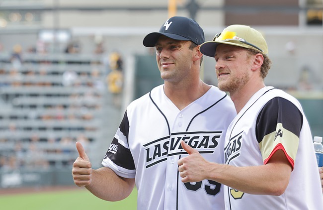 Team captains Las Vegas Raiders tight end Brock Bowers, left, and Vegas Golden Knights center Jack Eichel pose before the annual Battle For Vegas charity softball game between the Las Vegas Raiders and the Vegas Golden Knights at the Las Vegas Ballpark Saturday, July 12, 2025. This year's Battle For Vegas takes place tonight, June 27, 2026, at Las Vegas Ballpark.