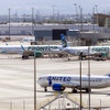 A United Airlines passenger jet taxis to a gate after landing at Harry Reid International Airport Wednesday, Aug. 13, 2025.