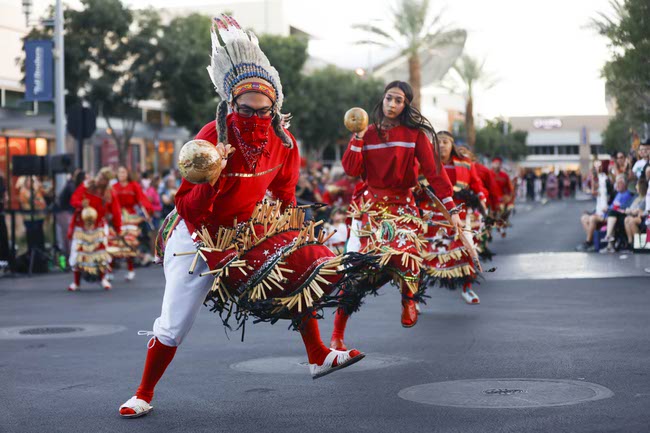Members of Danza Del Carrizo representing northern Mexico perform during the Latin Heritage Parade at Downtown Summerlin, Tuesday, Sept. 16, 2025.