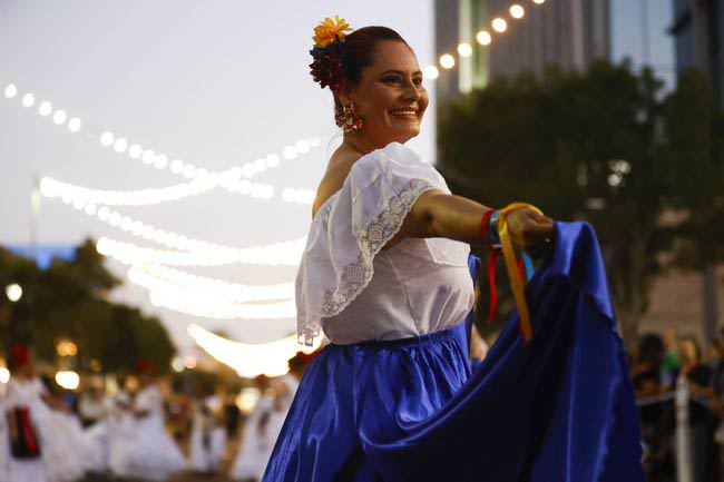 Performers march during the Latin Heritage Parade at Downtown Summerlin, Tuesday, Sept. 16, 2025.