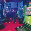 Attendees at the Global Gaming Expo visit the GamingArts booth Tuesday, Oct. 7, 2025, at the Venetian Expo Center. A G2E panel discussion revolved around tariffs President Donald Trump has imposed and their effect on the cost to gaming equipment manufacturers and buyers.