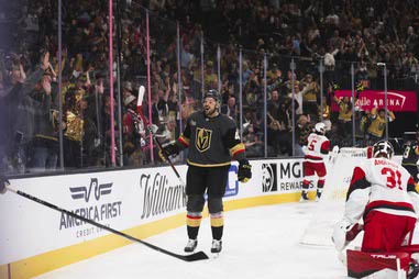 Vegas Golden Knights left wing Ivan Barbashev (49) reacts after Vegas Golden Knights center Jack Eichel (9) scores against the Carolina Hurricanes during the first period of a NHL hockey game at T-Mobile Arena, Monday, Oct. 20,&nbsp;2025.
