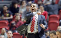 Josh Pastner's philosophy is impossible to miss. Walk into the UNLV locker room, and you’ll find it plastered on the walls: “Winning this possession is more important than breathing,” the signage proclaims.