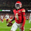 Kansas City Chiefs wide receiver Rashee Rice (4) celebrates after scoring during the second half of an NFL football game against the Washington Commanders Monday, Oct. 27, 2025, in Kansas City, Mo. 