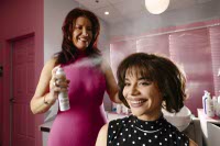 Azure White, left, gives a blowout to her daughter Bailee Read at Blo Blow Dry Bar's newest location in Southwest Las Vegas, Thursday, Oct. 30, 2025. WADE VANDERVORT