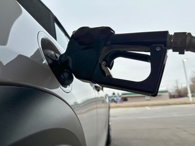 A motorist fills up the tank of a vehicle at a gasoline station Sunday, Nov. 30, 2025, in Littleton,&nbsp;Colo.
