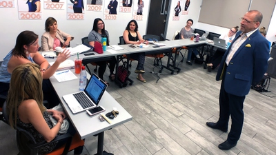 International School of Hospitality instructor Lenny Talarico discusses latest trends with event planning students.