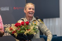 Metro Police Officer Deb Rinkovsky drove her squad car east on Charleston Boulevard last November during a rainstorm when she spotted a person in need. 