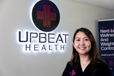 Jennifer Dao, left, director of operations, poses in the lobby at Upbeat Health Thursday, Feb. 5, 2026.