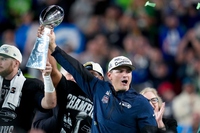 Seattle Seahawks head coach Mike MacDonald hold the Lombardi Trophy after defeating the New England Patriots the NFL Super Bowl 60 football game, Sunday, Feb. 8, 2026, in Santa Clara, Calif. 
