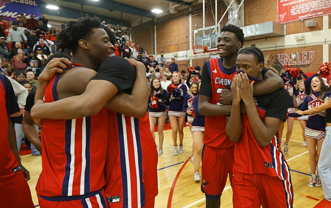 Coronado Players celebrate after beating Liberty in the boy’s 5A state championship basketball game at Valley High School Friday, Feb. 20, 2026. Coronado defeated Liberty 60-55.
