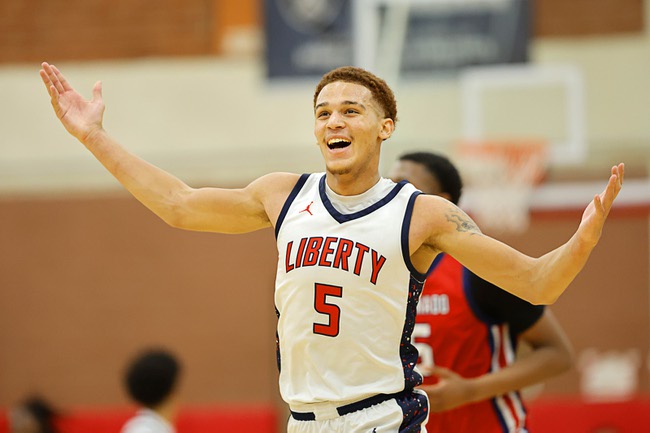 Liberty’s Dante Steward (5) celebrates after making a three-point basket against Coronado during the boy’s 5A state championship basketball game at Valley High School Friday, Feb. 20, 2026. Coronado defeated Liberty 60-55.