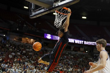 UNLV forward Tyrin Jones (6) dunks against Utah State during the second half of an NCAA college basketball game in the Mountain West Championships tournament Thursday, March 12, 2026. UNLV fell to Utah State&nbsp;80-60.