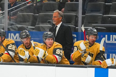 Vegas Golden Knights head coach John Tortorella, center top, looks on during the first period of an NHL hockey game against the Vancouver Canucks, Monday, March 30, 2026, in Las&nbsp;Vegas.