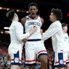 UConn forward Tarris Reed Jr., center, celebrates after the second half of an NCAA college basketball tournament semifinal game against Illinois at the Final Four, Saturday, April 4, 2026, in Indianapolis.