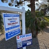 A for-sale sign stands in front of a home in an east Las Vegas neighborhood near Charleston and Nellis boulevards.