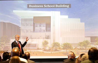 UNLV Interim President Chris Heavey talks about a proposed new business school building during the annual State of the University address at the Thomas & Mack Center Wednesday, April 8, 2026.