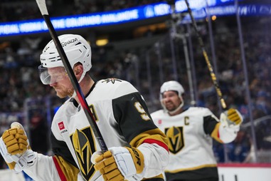 Vegas Golden Knights center Jack Eichel, front, reacts after scoring the winning goal as right wing Mark Stone celebrates in overtime of an NHL hockey game against the Colorado Avalanche Saturday, April 11, 2026, in&nbsp;Denver. 