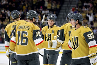 Vegas Golden Knights center Jack Eichel, center, celebrates with teammates after scoring against the Winnipeg Jets during the third period of an NHL hockey game at T-Mobile Arena Monday, April 13, 2026. The NHL has released the Golden Knights schedule for the 2026-27&nbsp;season.