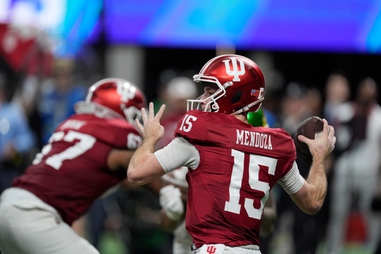 Indiana quarterback Fernando Mendoza (15) works in the pocket against Oregon in the Peach Bowl NCAA college football playoff semifinal, Friday, Jan. 9, 2026, in&nbsp;Atlanta. 