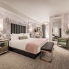 A standard room with a king bed is shown at The Vanderpump Hotel, which is set to open in May 2026 on the Las Vegas Strip in the space last occupied by The Cromwell. Reality television star Lisa Vanderpump and her design partner, Nick Alain, conceived the guest rooms' color schemes and furnishings.