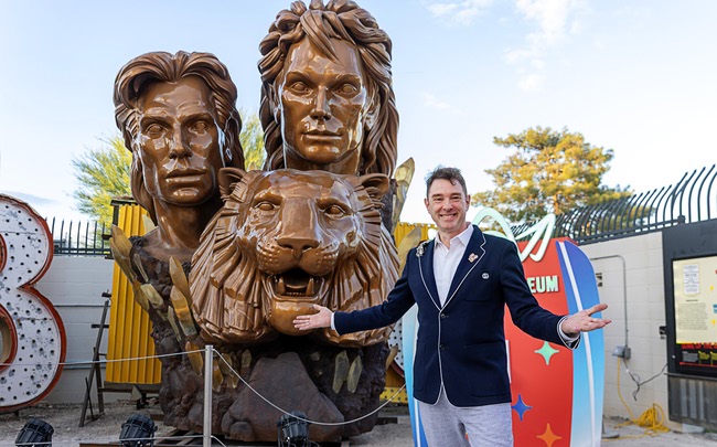 Aaron Berger, executive director/CEO of The Neon Museum, poses before a lighting ceremony for the restored 3,600-lb. Siegfried & Roy statue at the museum Friday, April 24, 2026. The statue, previously located in front of the Mirage on The Strip for more than 30 years, was donated to the museum after Hard Rock International acquired the property.