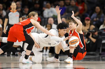 Aces Defeat Japan 94-78