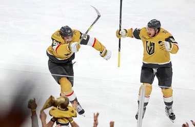 Vegas Golden Knights center Brett Howden, left, celebrates with Vegas Golden Knights defenseman Jeremy Lauzon (5) after scoring against the Utah Mammoth during second overtime of Game 5 in a first-round NHL hockey Stanley Cup playoff series at T-Mobile Arena Wednesday, April 29, 2026.