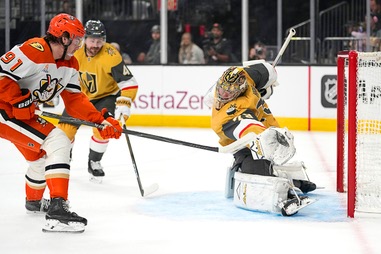 Anaheim Ducks center Leo Carlsson (91) attempts to shoot past Vegas Golden Knights goaltender Carter Hart (79) during the first period of Game 1 of a second-round NHL hockey Stanley Cup playoff series Monday, May 4, 2026, in Las&nbsp;Vegas.