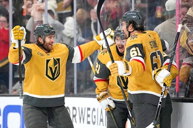 Vegas Golden Knights center Brett Howden, second from left, celebrates after scoring against the Anaheim Ducks during the second period of Game 1 of a second-round NHL hockey Stanley Cup playoff series Monday, May 4, 2026, in Las Vegas.