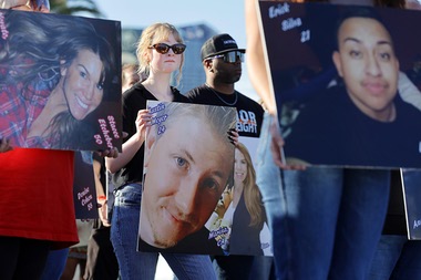 Fifty-eight survivors of the Oct. 1, 2017, mass shooting on the Strip stood together Thursday evening in a circle on the future grounds of the permanent memorial. Each held a picture of someone lost in the massacre nine years ago.