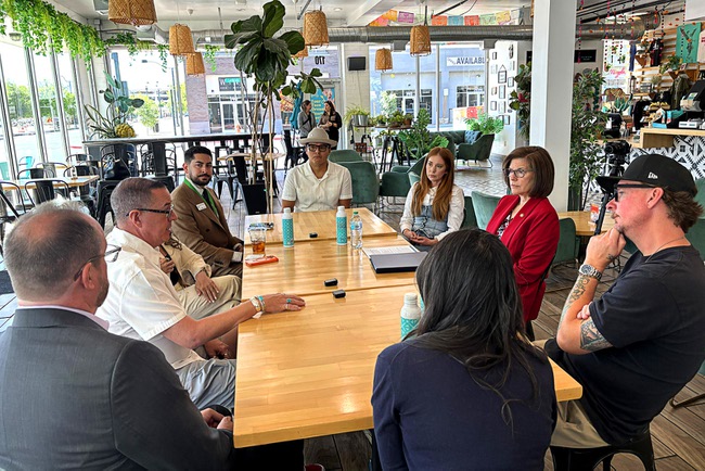 Sen. Catherine Cortez Masto, second from right, D-Nev., talks with business owners during a small business event at Tacotarian in the Arts District Thursday, May 7, 2026.