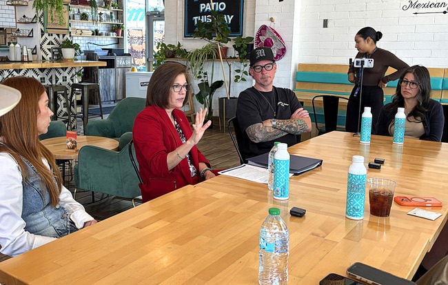 Sen. Catherine Cortez Masto, second from left, D-Nev., speaks with business owners during a small business event at Tacotarian in the Arts District Thursday, May 7, 2026. Listening at the table are Kristen Corral, left, co-owner of Tacotarian, and Austin Spencer and Megan Comfort, owners of Studio 21 Tattoo.