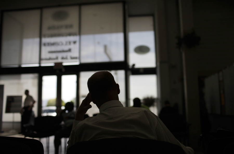 An unemployed worker waits to talk to a job counselor at a EmployNV Career Hub in Las Vegas in this undated file photo.